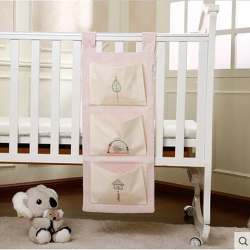 "Organize and Simplify: Baby Bed Hanging Storage Bag for Crib Bedding Set - Perfect for Toys, Diapers, and More!"