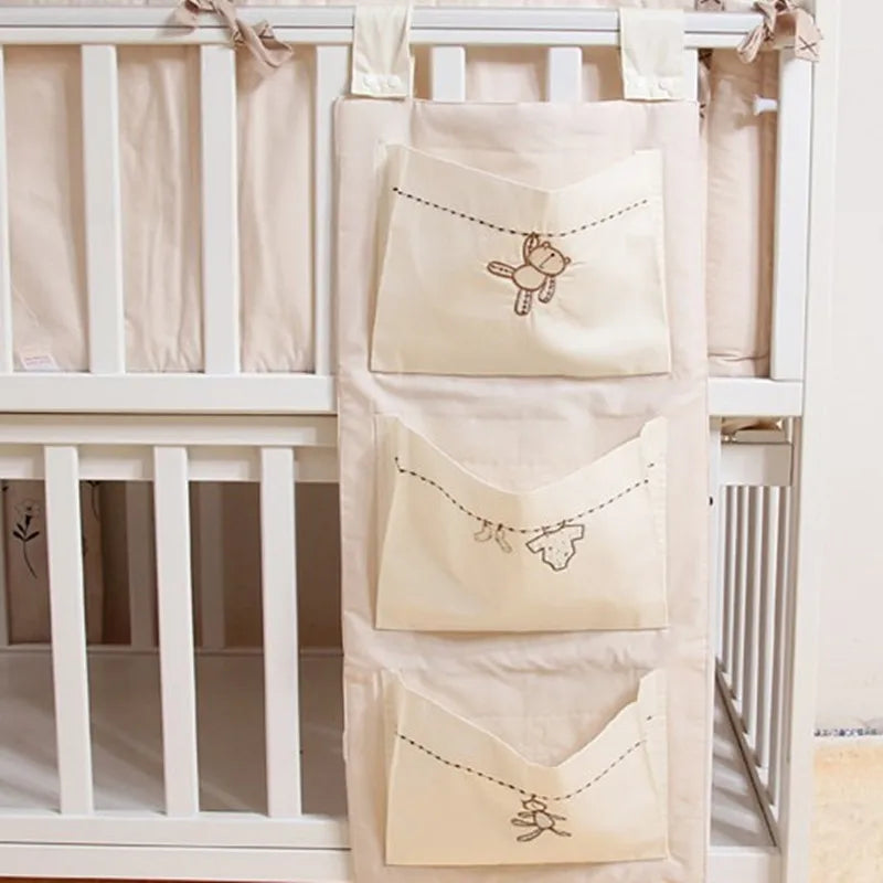 "Organize and Simplify: Baby Bed Hanging Storage Bag for Crib Bedding Set - Perfect for Toys, Diapers, and More!"