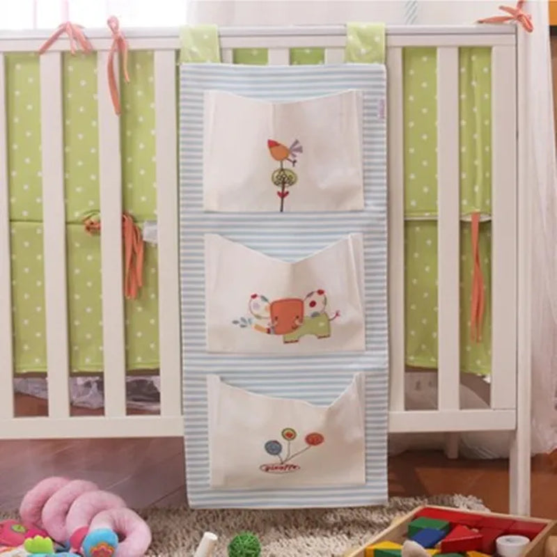 "Organize and Simplify: Baby Bed Hanging Storage Bag for Crib Bedding Set - Perfect for Toys, Diapers, and More!"